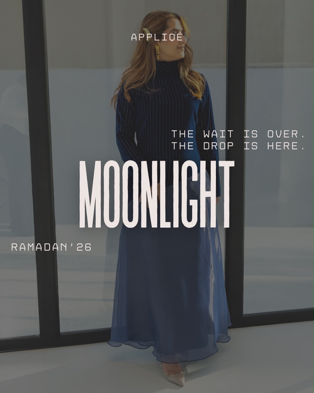 Appliqué Moonlight Ramadan '26 campaign — a navy velvet abaya with embroidered silk organza skirt, photographed in Bahrain