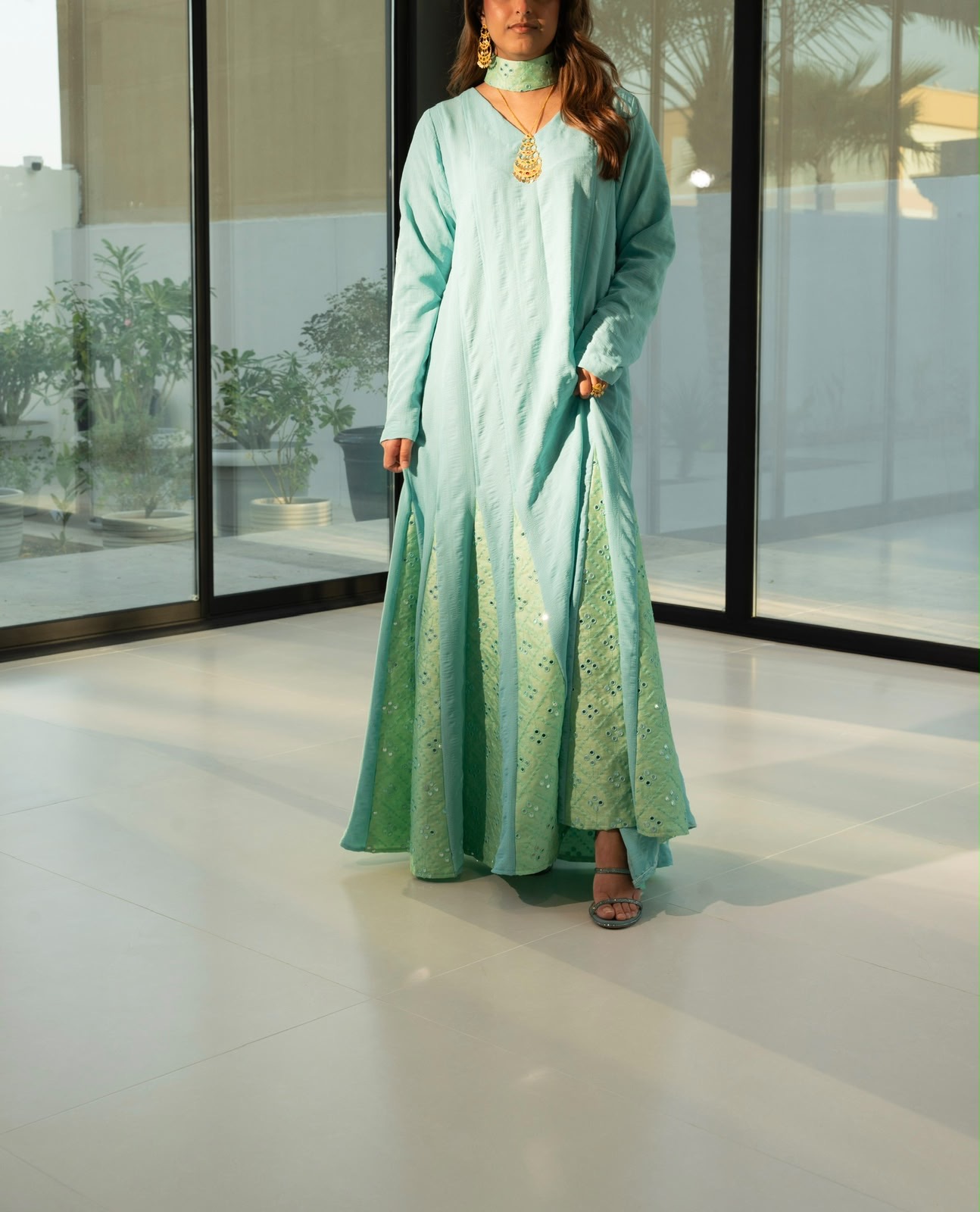 Mint sage kaftan with green eyelet appliqué panels by Appliqué, full length view